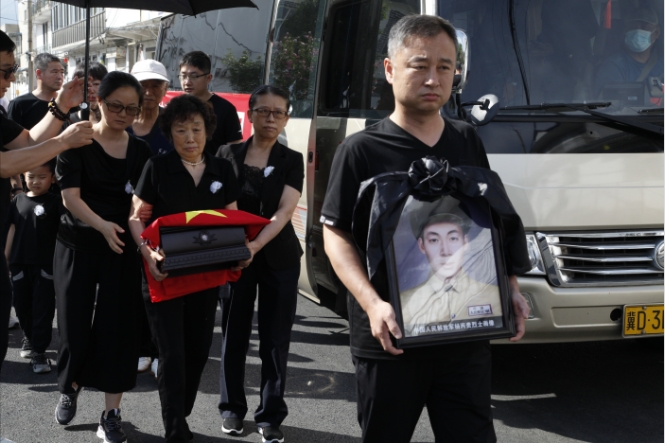 那年，你们挺进大别山；今天，我们接你们回家